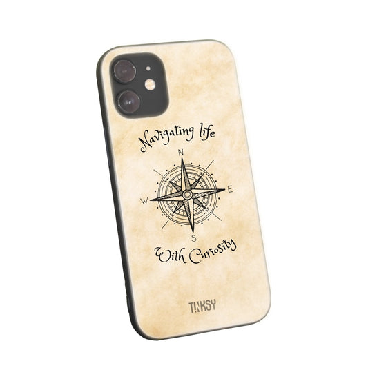 Phone case with a vintage compass design on a beige background