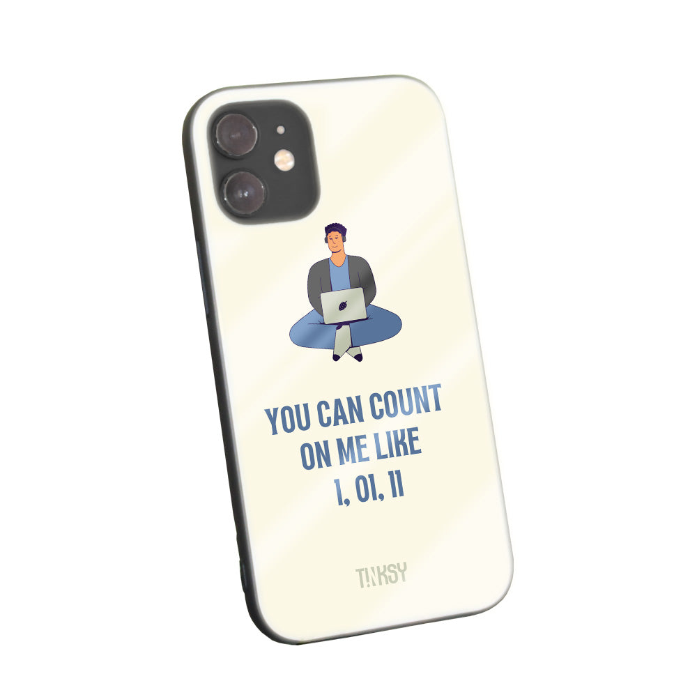 Phone case with an illustration of a person using a laptop and a humorous phrase on a beige background