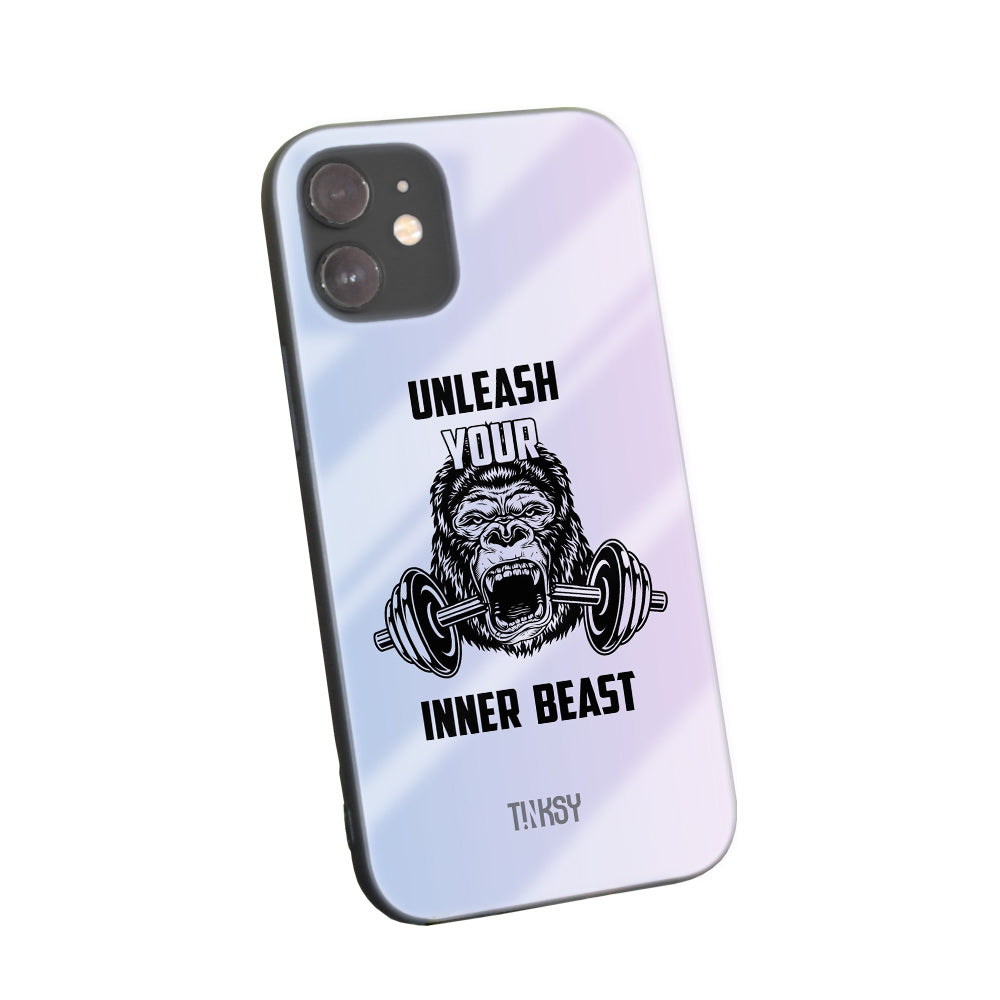 Phone case with a gorilla lifting weights and the phrase "Unleash Your Inner Beast" on a glossy background.